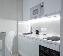 Двухместная студия Deluxe с балконом двуспальная кровать в Апартаменты Новая в Престижном ЖК Минск-Мир