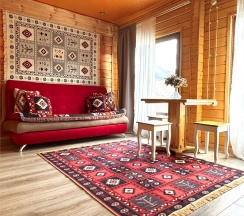 Двухкомнатный комфорт с общей террасой и видом на горы | 2 этаж в Hayat Haus