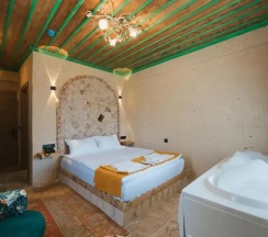 Двухместный люкс двуспальная кровать в La Casa Cave