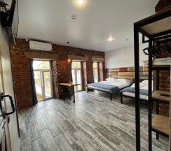 Трехместный семейный номер в Loft Apart