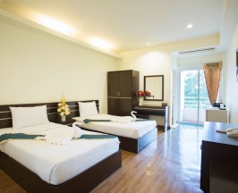 Двухместный номер Standard с балконом 2 отдельные кровати в Tharakiree Place Hotel