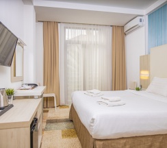 Делюкс с кроватью KING SIZE для 2 гостей в Мио