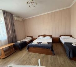 Стандартный четырехместный комната в Das house