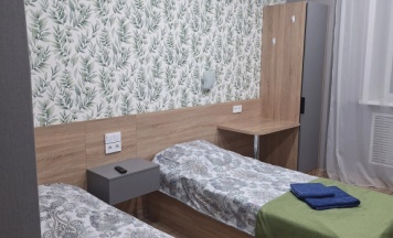 Кровать в общем номере в Плесецкая