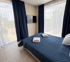 Стандарт с видом на окрестности и общим балконом (dbl+Extra Bed)) в Costa d`Ora