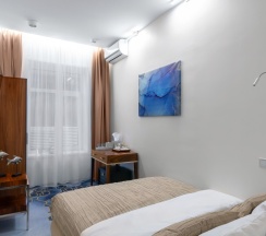 Уменьшенный стандарт с одноместным размещением в V Hotel&Rooftop lounge