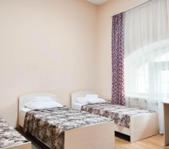 Кровать в 3-местном общем номере в Smart Hotel KDO Саранск
