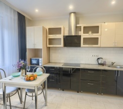 Апартаменты с балконом и с красивым видом из окна в Апартаменты Appartement De Luxe Дуэт
