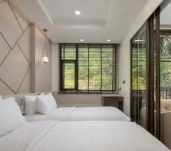 Двухместный номер Premier 2 отдельные кровати в The Proud Karon Beach Phuket Trademark Collection By Wyndham