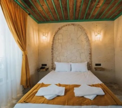 Двухместный люкс двуспальная кровать в La Casa Cave