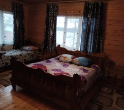 Коттедж стандарт с 1 односпальной и 1 двуспальной кроватью в Селигерский бережок