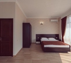 Двухместный люкс с 2 комнатами с балконом двуспальная кровать в Олимпия