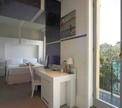 Четырёхместный семейный номер Deluxe с видом на море в Hotel Piccolo Portofino