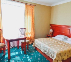 Номер стандарт с 1 двуспальной кроватью в Атис