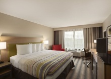 Двухместный люкс двуспальная кровать в Country Inn & Suites by Radisson, Austin North (Pflugerville), TX