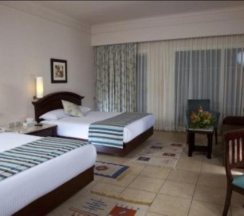 Двухместный номер Standard с видом на сад 2 отдельные кровати в Coral Beach Resort
