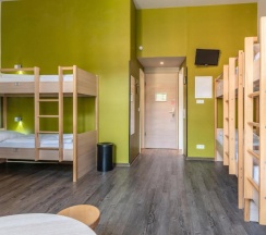 Кровать в общем номере в MEININGER Hotel Berlin Mitte