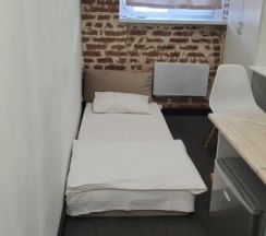 Трехместный номер Лофт с двуспальной и раскладным креслом/кроватью в Лофт отель на Крымской