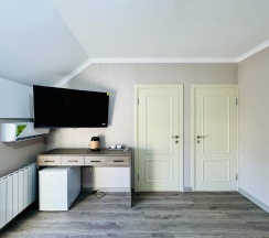 Семейный номер на мансарде в Граф