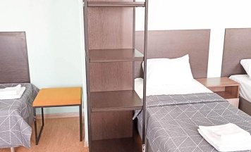 Кровать в 6-местном общем номере в Smart Hotel KDO Челябинск