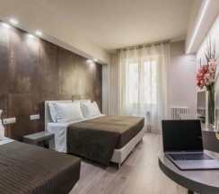 Четырёхместный номер Deluxe в Astoria Deluxe Rooms,,Check in presso L’Hotel Astoria, Via Fratelli Rosselli 14 ,,