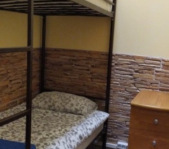 Кровать в общем номере в Ideal home