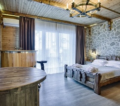 Двухместный 25 люкс с террасой с видом на море двуспальная кровать в Exclusive Hotel&Apartments