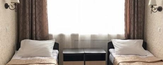 Кровать в 2-местном общем номере в Луза