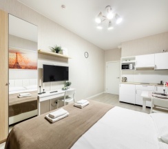 Улучшенная студия с кроватью king size и балконом в Pulkovo Apart