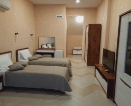 Первая категория  с двумя отдельными кроватями и диваном в Озёрная