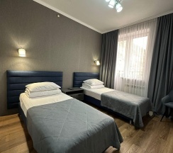 Номер стандарт с 2 односпальными кроватями с балконом в Альпина