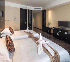 Двухместный номер Business (2 отдельные кровати) в Guangdong Nanmei Osotto Hotel