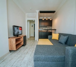 Апартаменты Comfort в Voswos Garage Coffee & Hotel