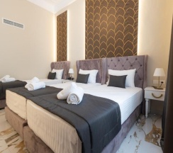 Трёхместный номер Deluxe в Modern Luxury Hotel