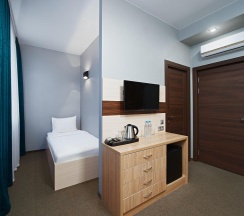 Номер стандарт с 2 односпальными кроватями в AurA City Hotel