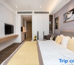 Двухместный номер Executive с балконом двуспальная кровать в Yidiandian Hotel Apartment (Shenzhen International Convention And Exhibition Center)
