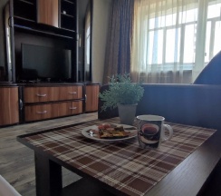 Четырёхместные апартаменты Superior с балконом и с видом на город в Квартира Двухкомнатная квартира на Радужном