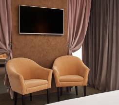Номер делюкс стандарт в AurA City Hotel