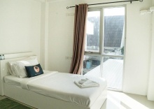 Номер Standard в RoomQuest Bangkok Sukhumvit 50