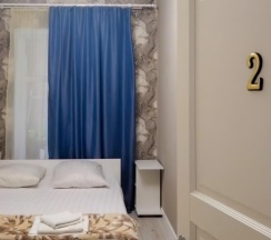 Эконом с 1 двуспальной кроватью и общей ванной комнатой (Без окна) в Мир