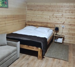 Двухместное шале с красивым видом из окна двуспальная кровать в Maas