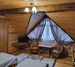 Двухместный номер с раздельными кроватями в деревянном коттедже в Колыба