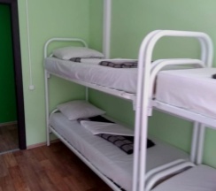 Кровать в общем номере (женский номер) с красивым видом из окна в ХотелХот Перово
