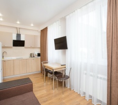 Делюкс апартаменты с балконом и видом на горы в Alba inn apartments