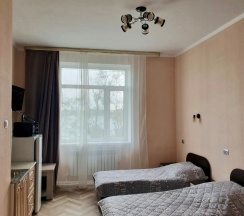 Студия с двумя односпальными кроватями в Советский