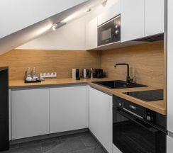 Двухместные апартаменты Deluxe Мансарда 2 отдельные кровати в The Basilian Minsk, Curio Collection by Hilton