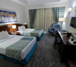 Двухместный люкс Executive Deluxe (двуспальная кровать) в Triumph Plaza Hotel