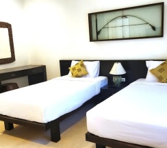 Двухместное бунгало Standard с балконом 2 отдельные кровати в Isara Nai Yang Resort