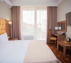 Номер первой категории "Комфорт с балконом" в Mari