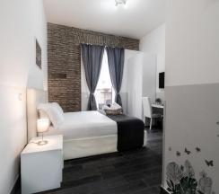 Двухместный номер Superior с балконом двуспальная кровать в Arch Rome Suites